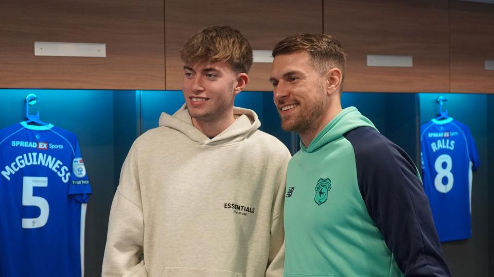 Aaron Ramsey interacts with Cardiff City fans