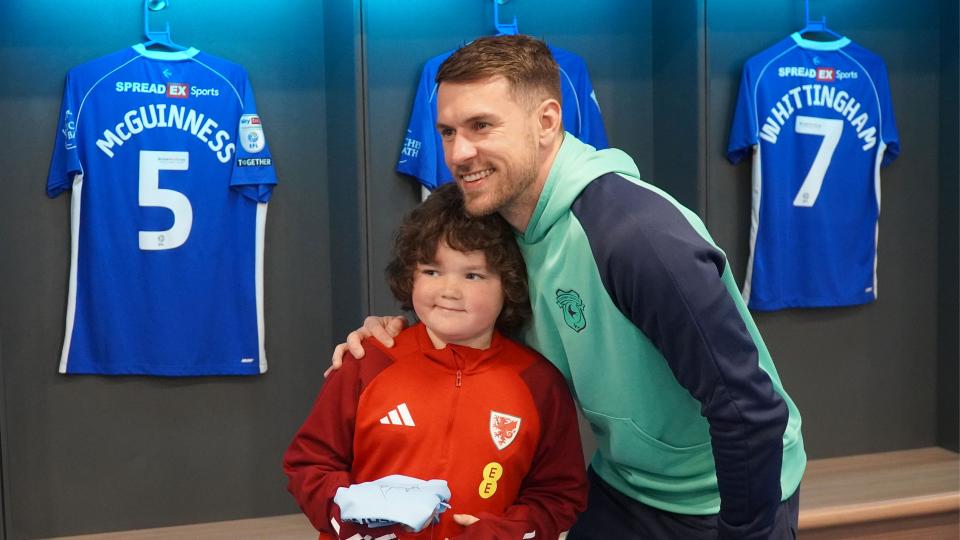 Aaron Ramsey interacts with Cardiff City fans
