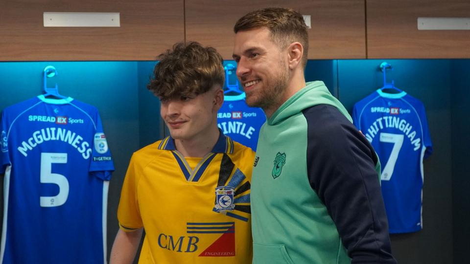 Aaron Ramsey interacts with Cardiff City fans