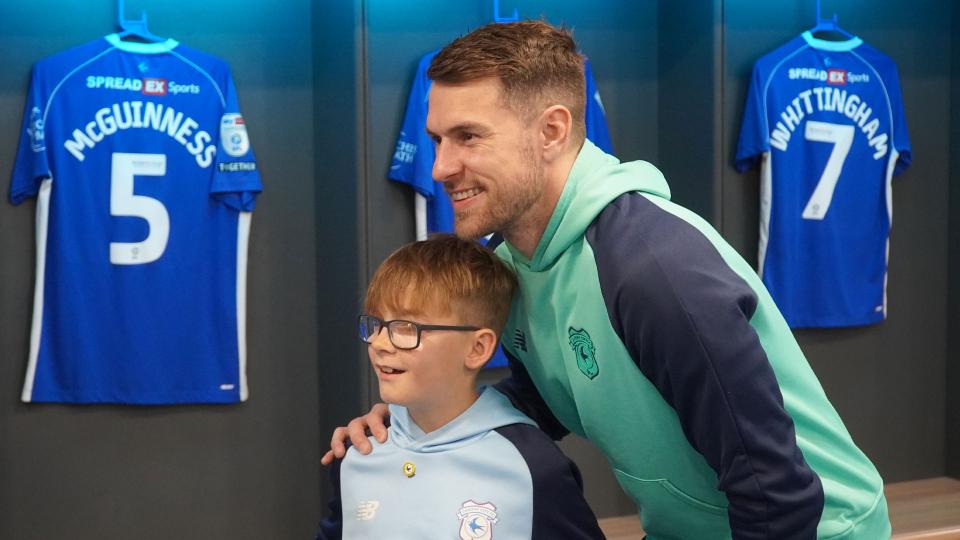 Aaron Ramsey interacts with Cardiff City fans