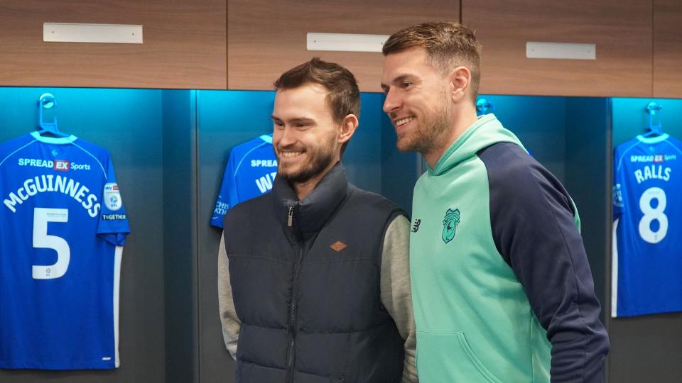 Aaron Ramsey interacts with Cardiff City fans