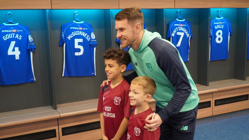 Aaron Ramsey interacts with Cardiff City fans