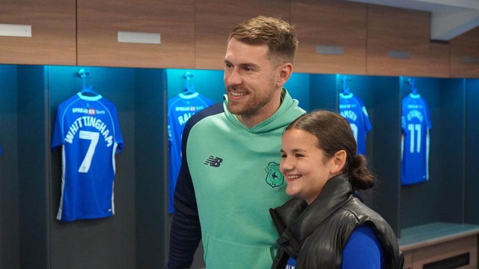 Aaron Ramsey interacts with Cardiff City fans