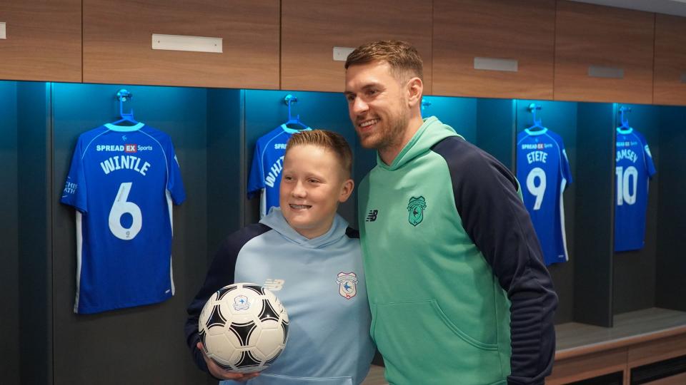 Aaron Ramsey interacts with Cardiff City fans