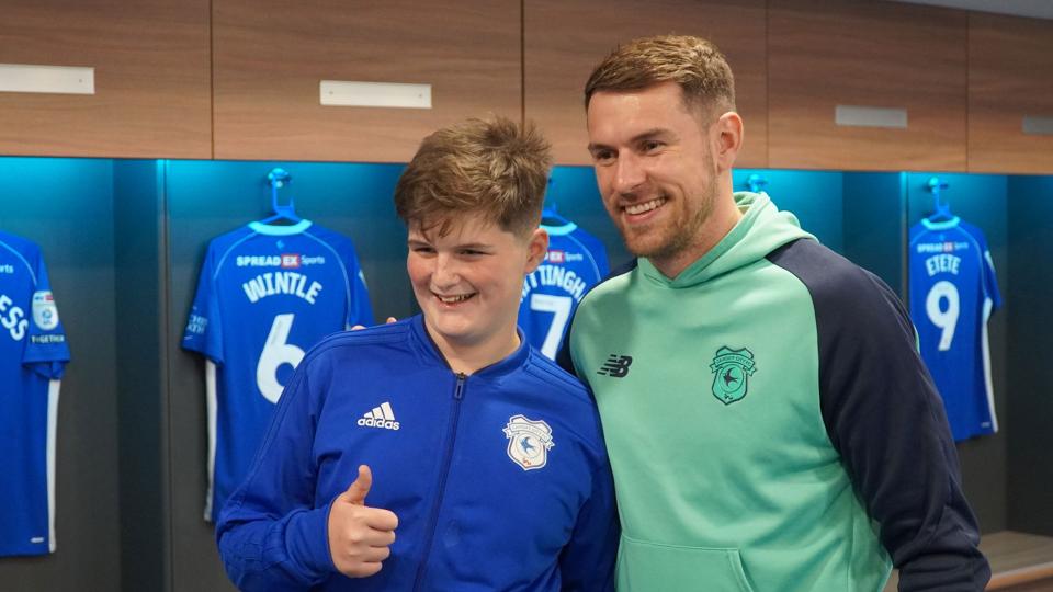 Aaron Ramsey interacts with Cardiff City fans