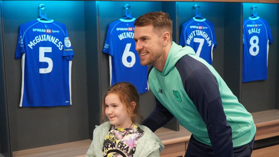 Aaron Ramsey interacts with Cardiff City fans