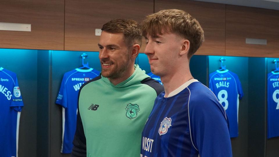 Aaron Ramsey interacts with Cardiff City fans