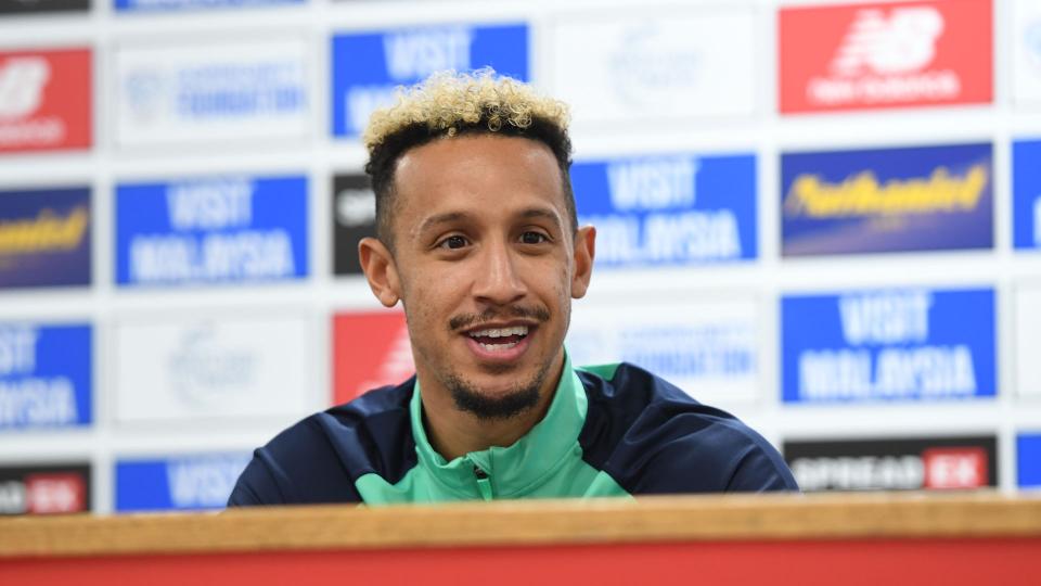 Callum Robinson speaks to the press