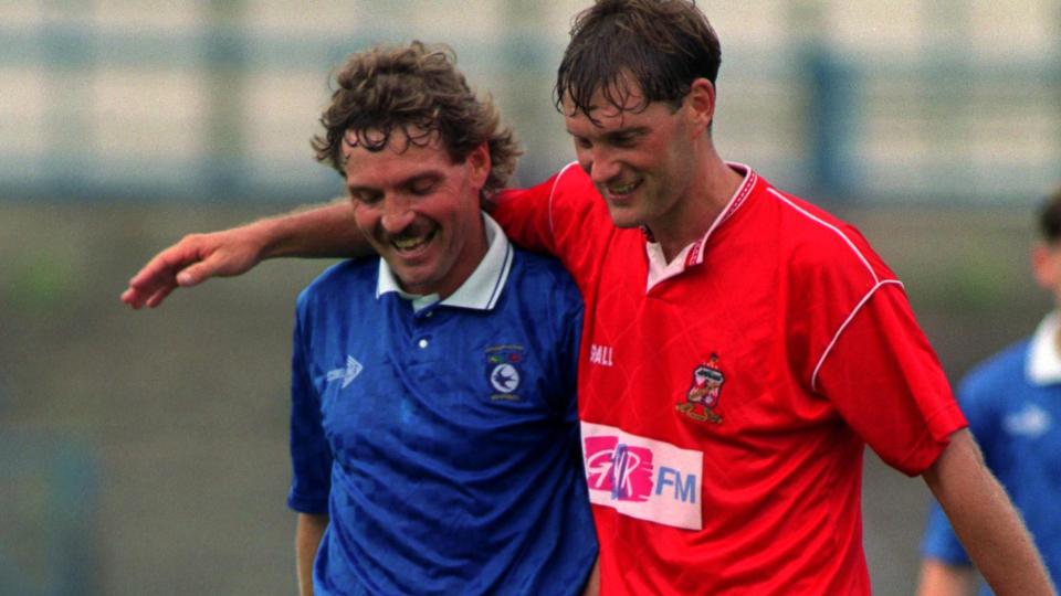 Roger Gibbins alongside Glenn Hoddle...