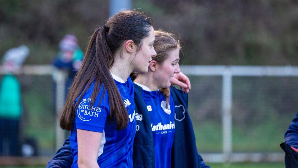 Megan Bowen celebrates with Mikayla Cook
