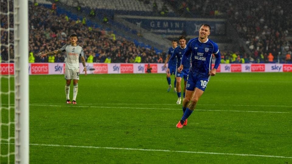 Aaron Ramsey celebrates his goal against Swansea City...