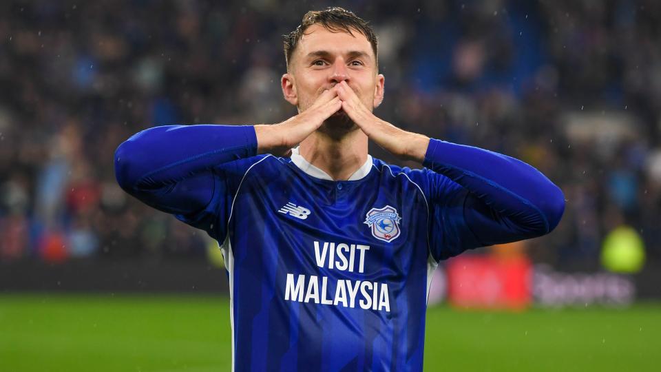 Aaron Ramsey celebrates his goal against Swansea City...