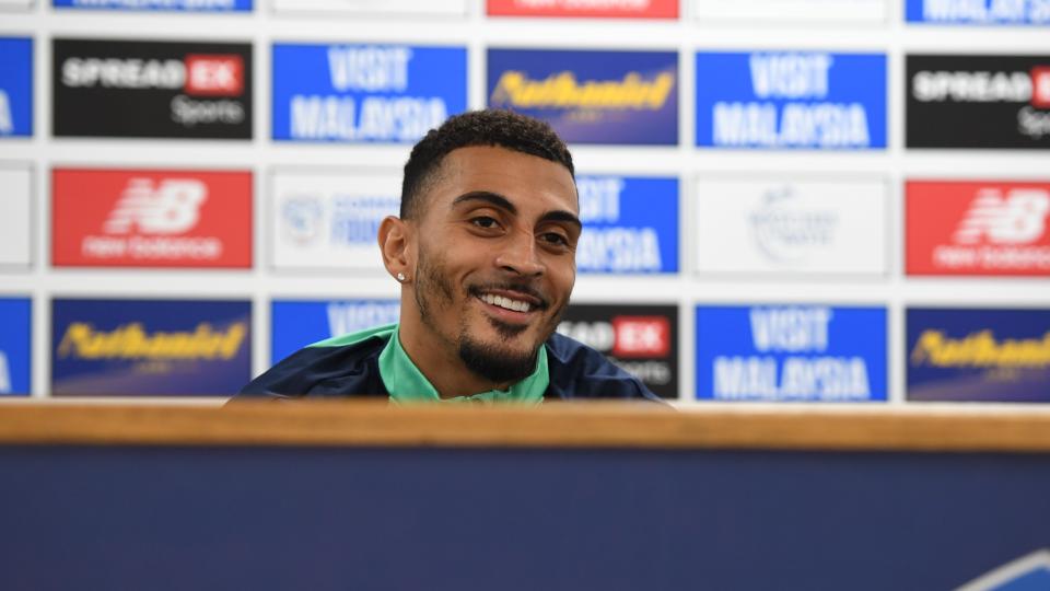 Karlan Grant speaks to the press