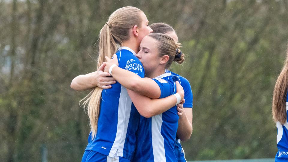 Rhianne Oakley celebrates with Seren Watkins