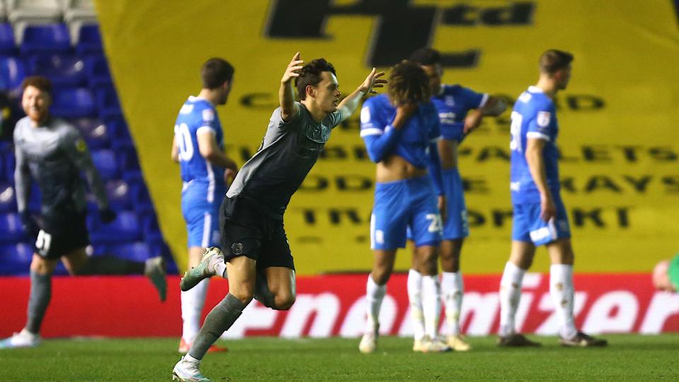 Perry Ng celebrates scoring for Cardiff City