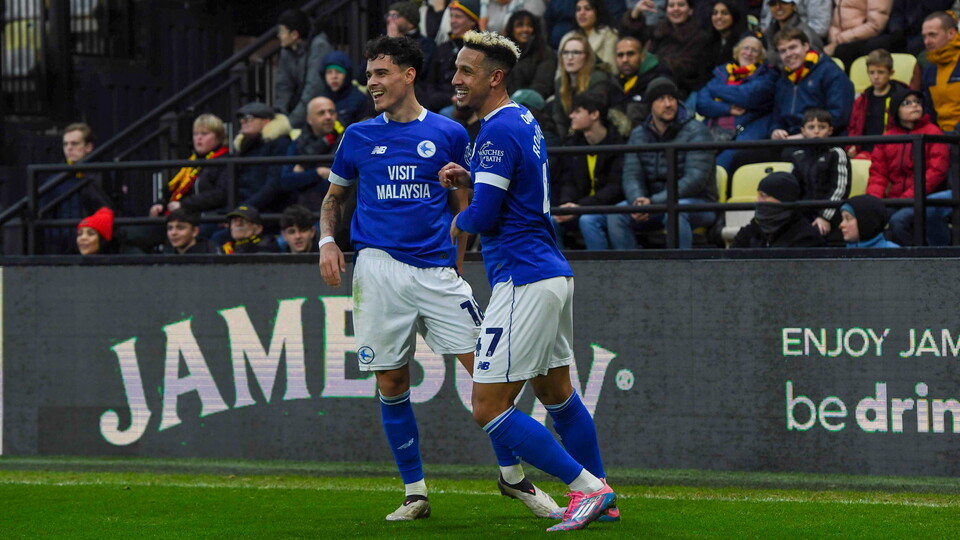 Callum Robinson celebrates at Vicarage Road...