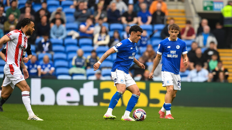 Alex Robertson on the ball against Stoke City.