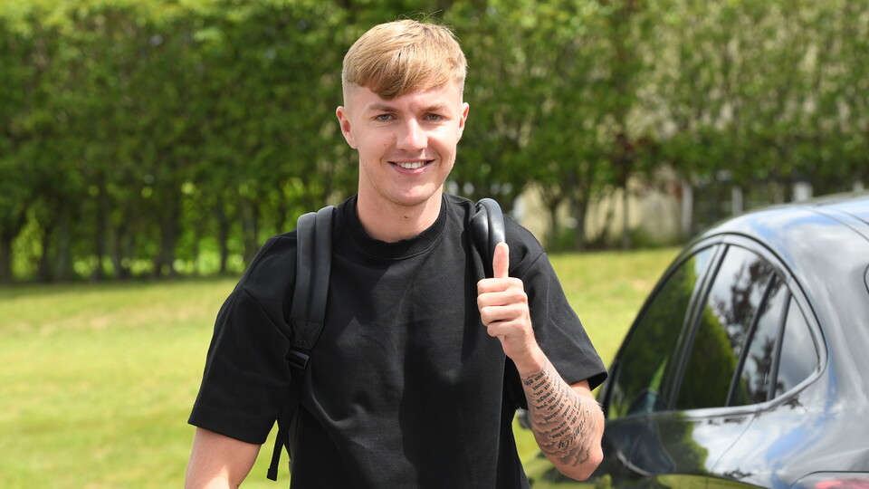 Joel Bagan reports for training...