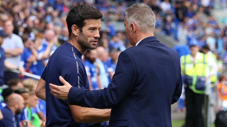 Brian Barry-Murphy and Darren Ferguson embrace before kick-off