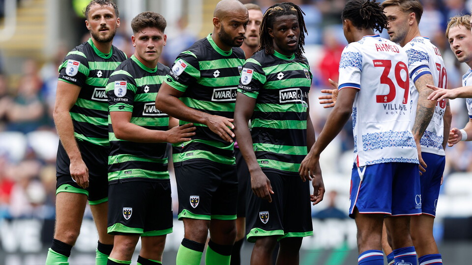 AFC Wimbledon compete against Reading...
