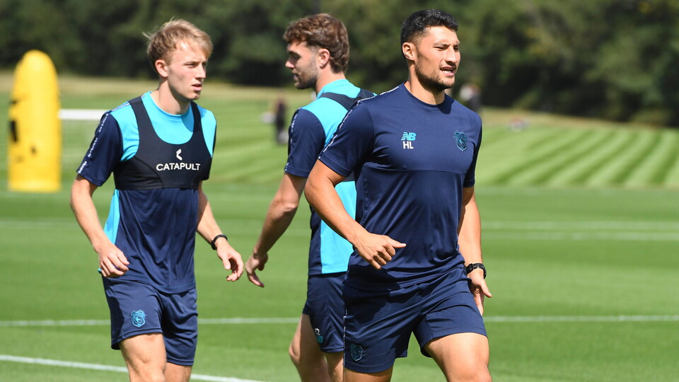 Eli King in training with Calum Chambers and Hayden Lau.