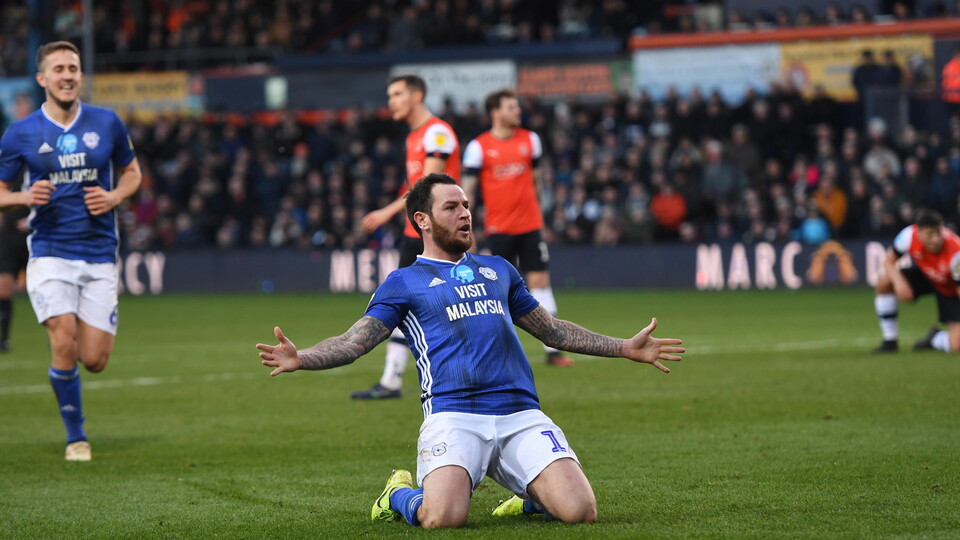 Lee Tomlin celebrates his goal against Luton Town...