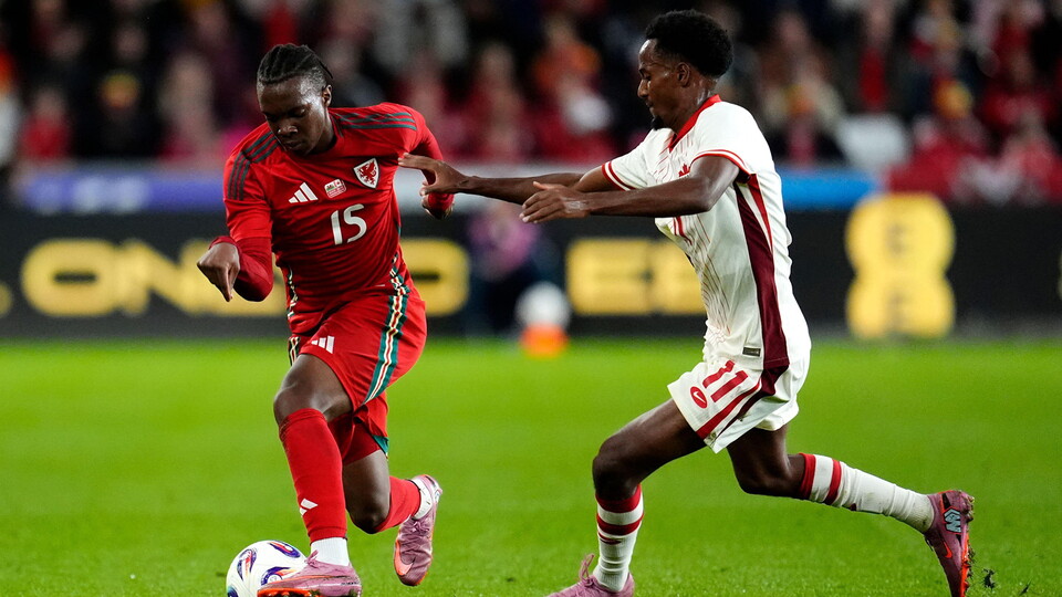 Ronan Kpakio in action for Wales.