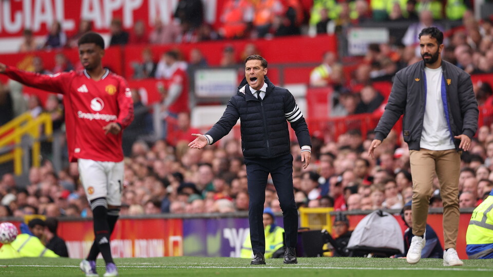 Scott Parker on the touchline.