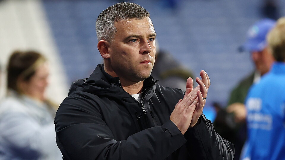 Steven Schumacher on the touchline.