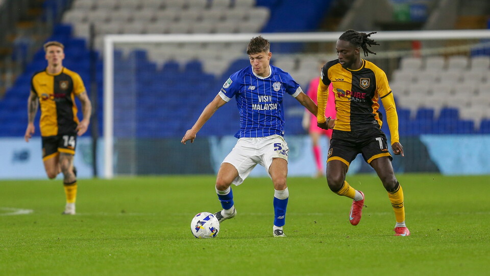 Troy Perrett competes for the ball against Newport County.