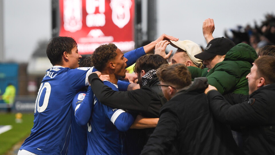 City celebrate scoring against Northampton Town