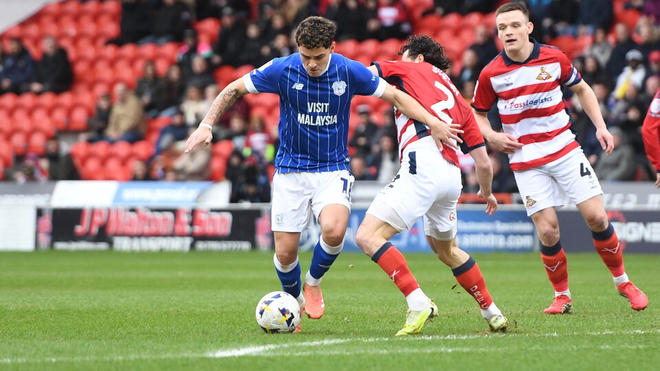 Alex Robertson in action against Doncaster Rovers.