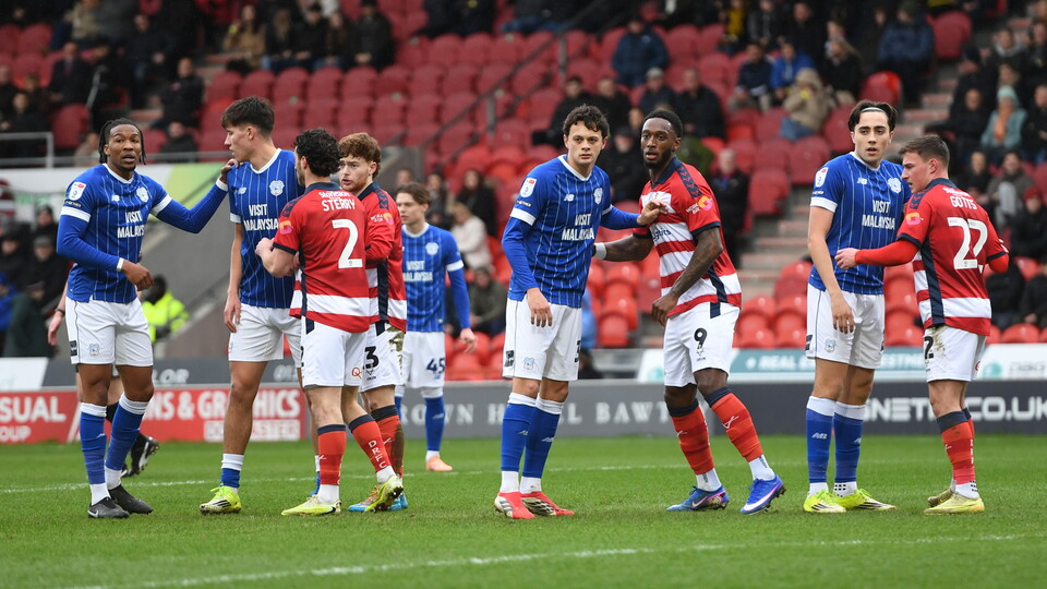The Bluebirds line-up to handle a set piece in Doncaster Rovers.