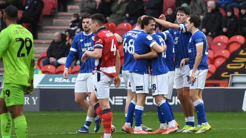The Bluebirds celebrate Alex Robertson's opener in Doncaster.