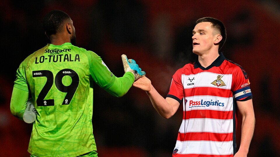 Doncaster Rovers' Owen Bailey celebrates.