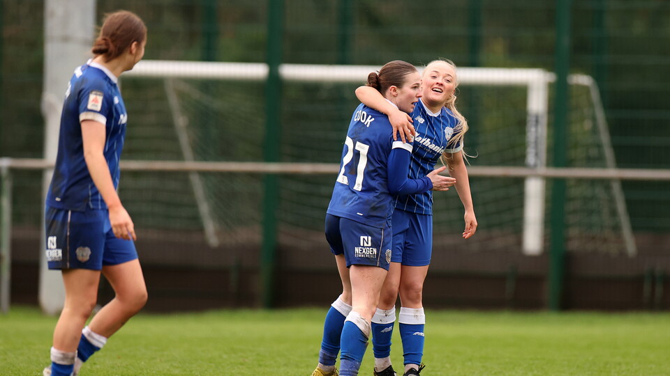 Mikayla Cook and Lily Billingham celebrate the first goal.