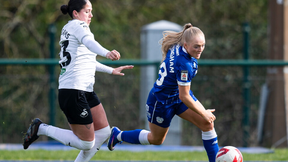 Lily Billingham takes on her marker as City face off against their South Wales rivals.
