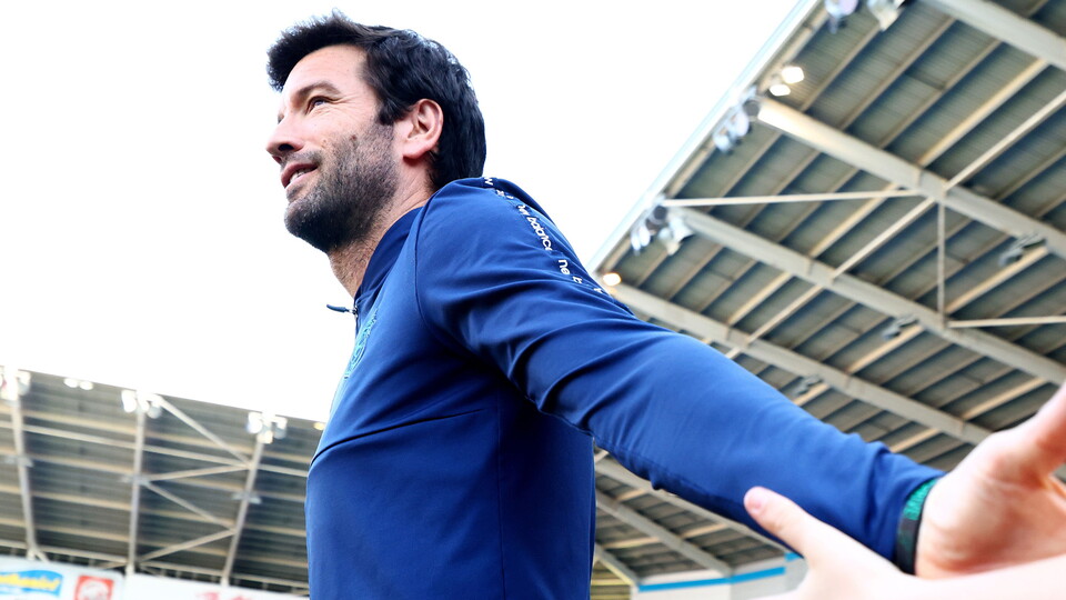 BBM celebrates with the City fans.