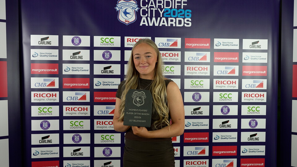 Lily Billingham holds her trophy for Women's Players' Player of the Season.