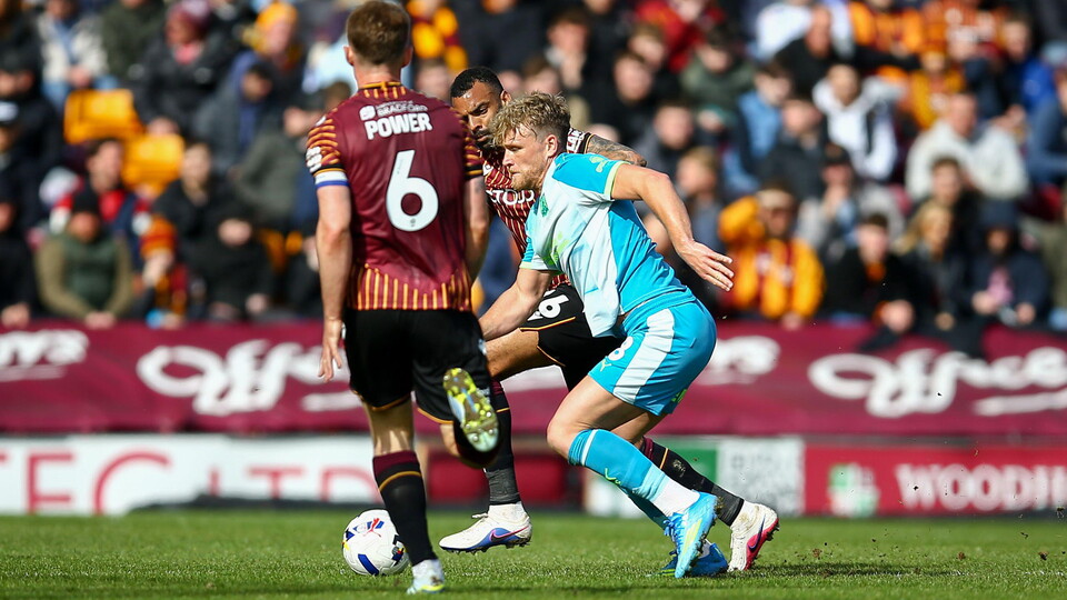 Cameron McGeehan in action for Northampton Town against Bradford City.
