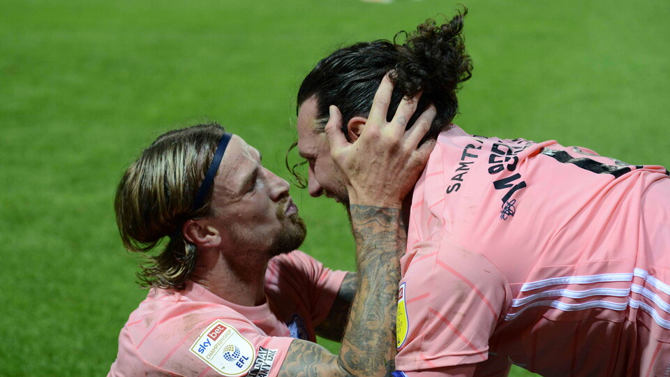 Aden Flint celebrates his brace with Sean Morrison.
