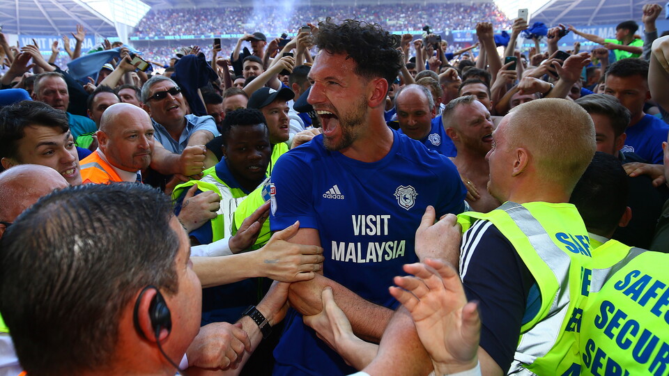 Sean Morrison celebrates with the City fans as the Bluebirds win promotion in 2018.