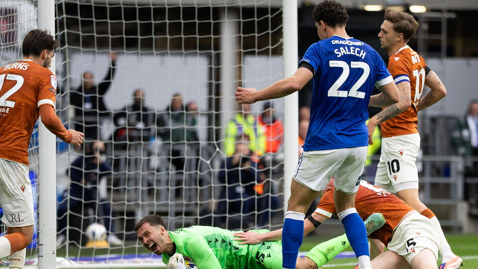 Yousef Salech battles in attack for City against Reading.