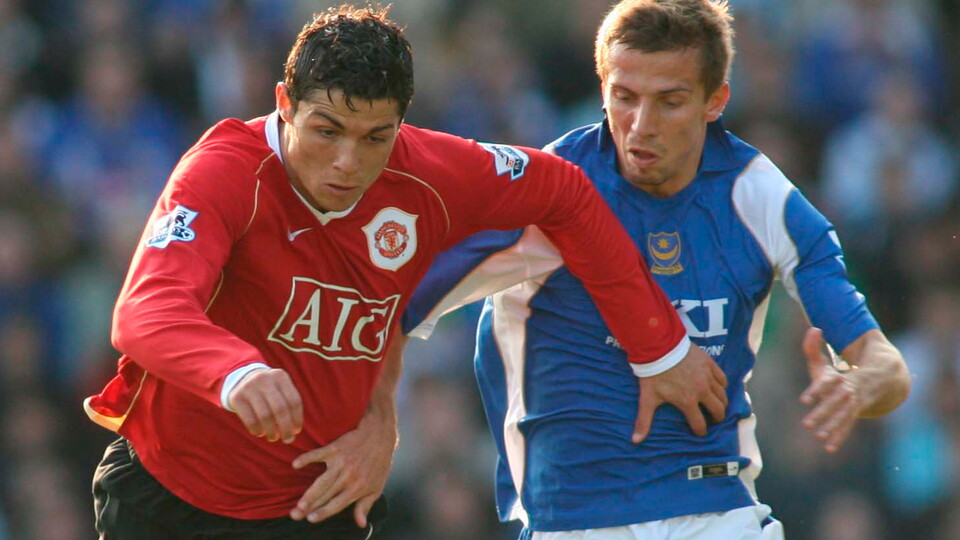 Former City and Portsmouth man battles for the ball with Cristiano Ronaldo