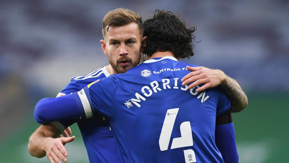 Joe Ralls and Sean Morrison celebrate against Luton Town...