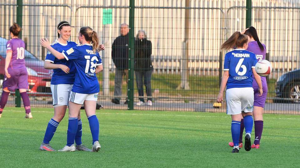Zoe Atkins celebrates her double against Cascade...