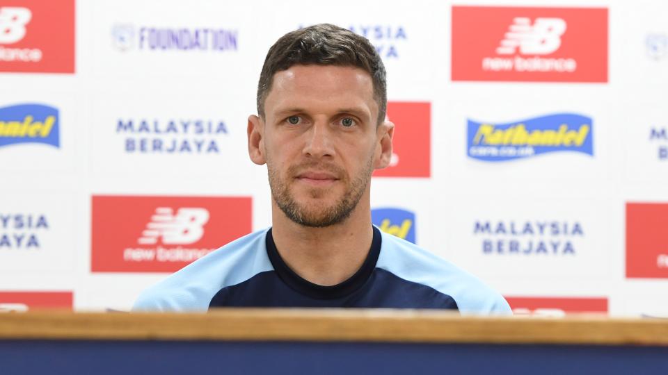 Mark Hudson speaks to the press pre-match.