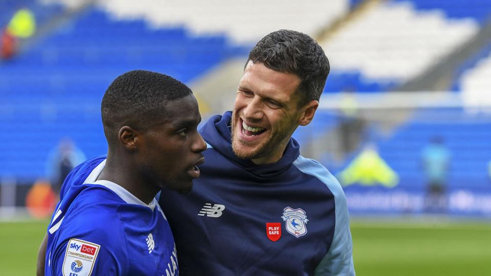 Mark Hudson and City defender Niels Nkounkou...
