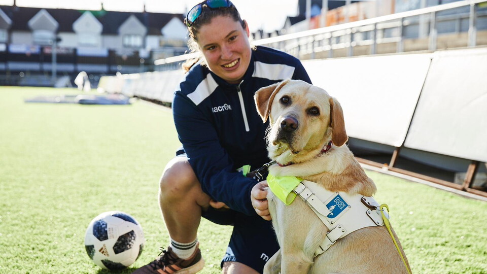 Chloe McBratney and Emily the guide dog
