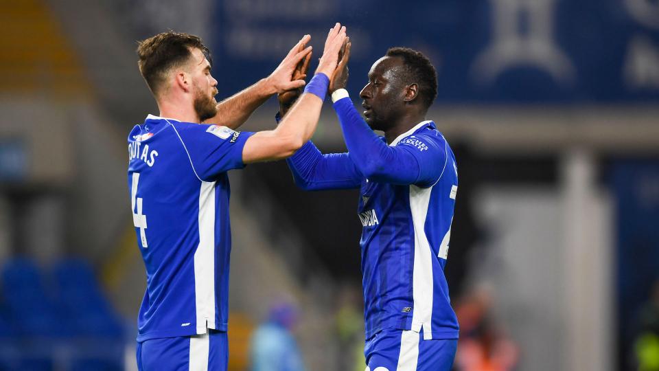 Famara Diédhiou and Dimitrios Goutas celebrate